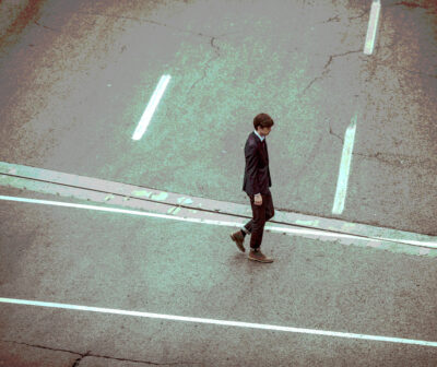 Young Man Walks Alone - Free Stock Image - Lensicle